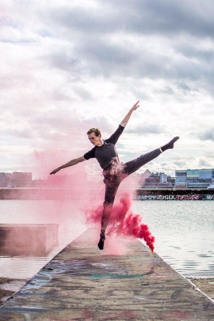 Dancer jumping on the NDSM Wharf in Amsterdam