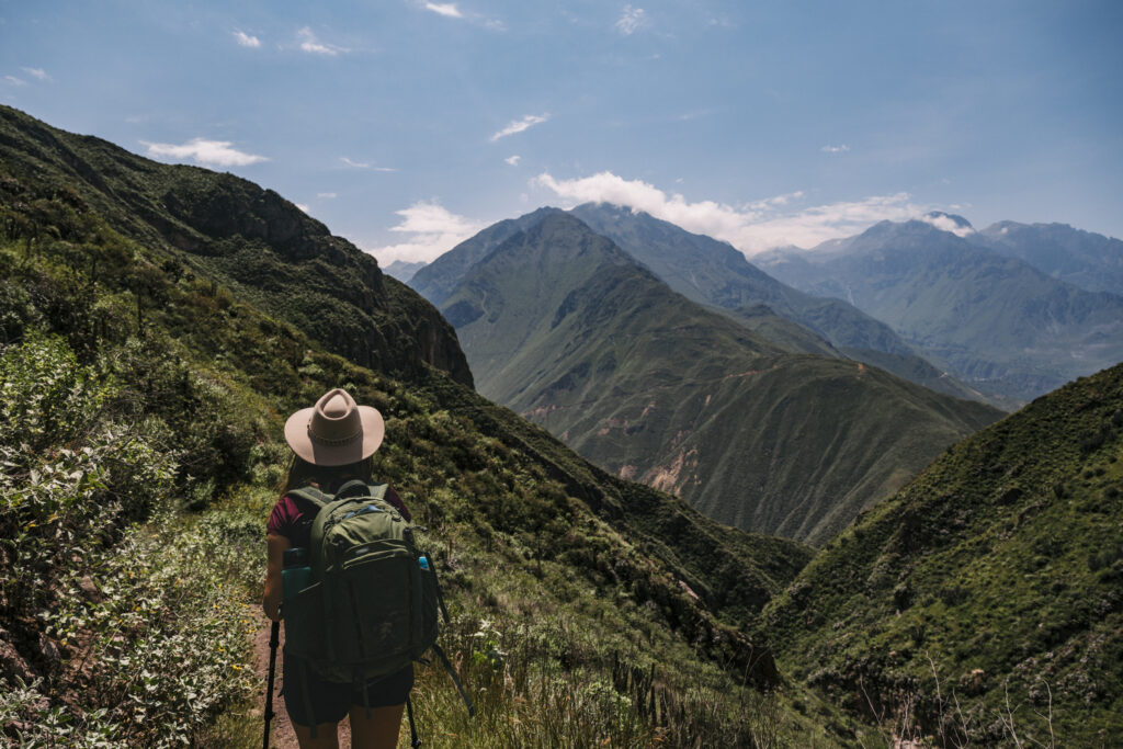 girl trekking from Cabanaconde to Llahuar in the colca canyon Peru