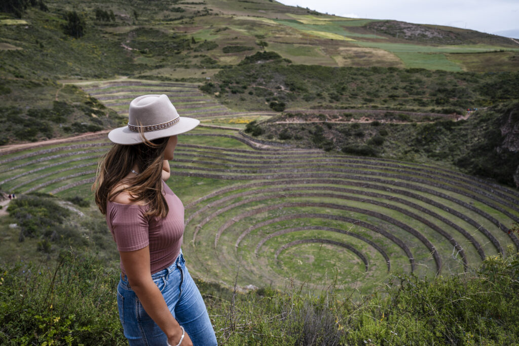 girl looking out over Moray -Part of the Sacred Valley