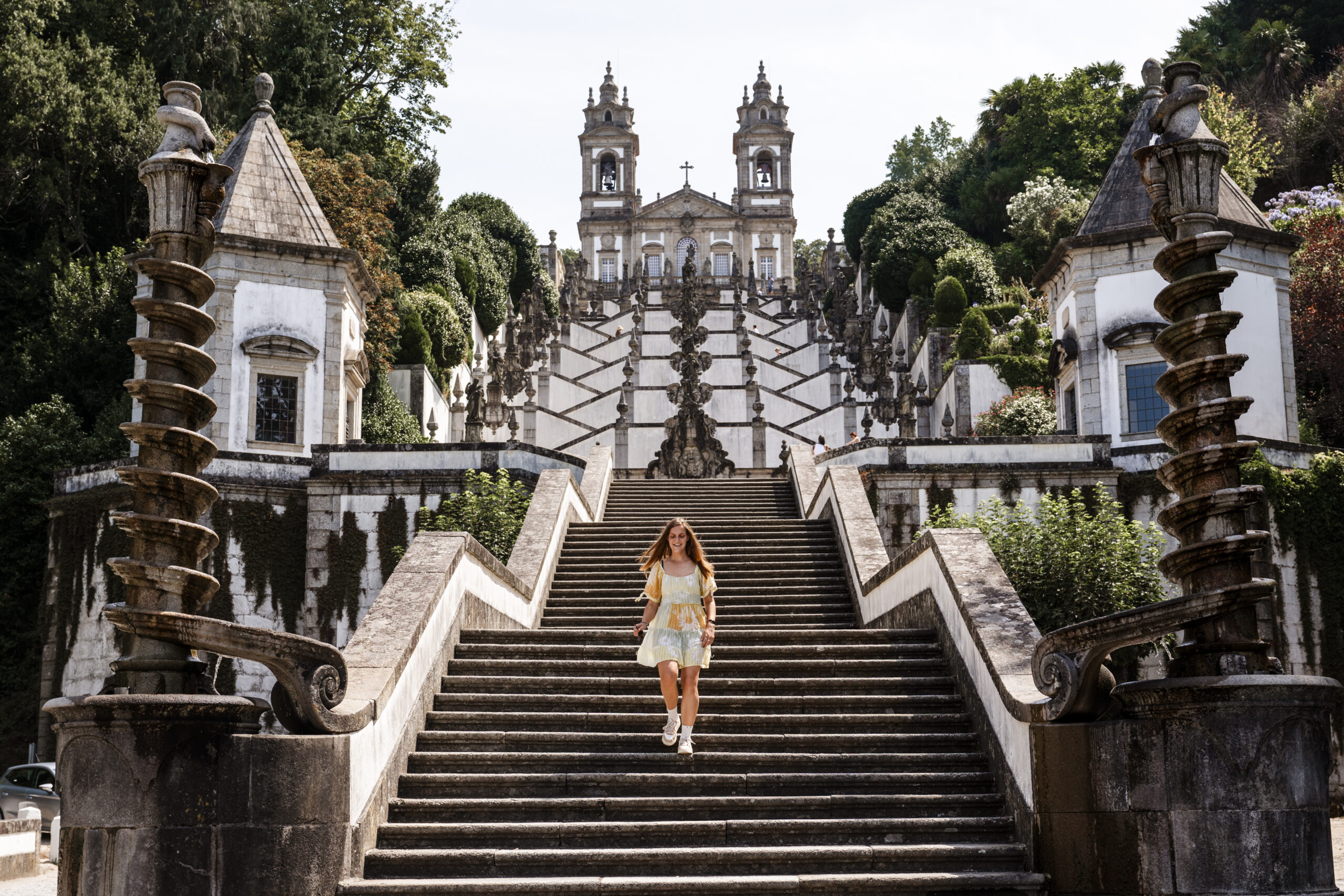 Girl going down famous steps of Bom Jesus church in Braga, Portugal