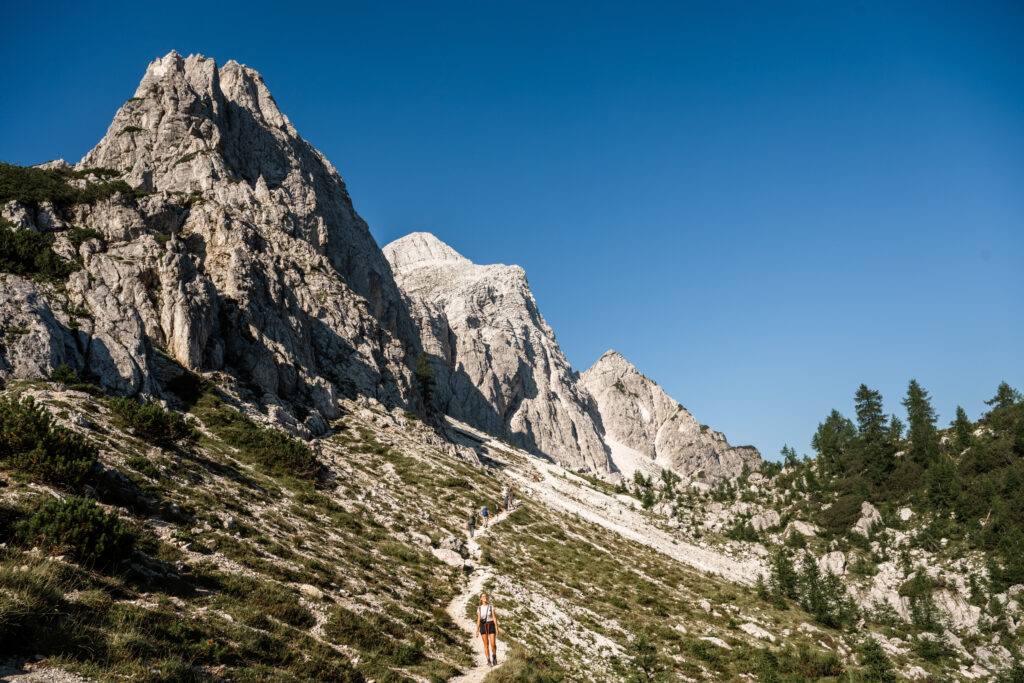 Hike Slemenova špica from the Vrsic pass in Slovenia - Brunette at